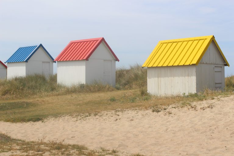 The Colourful Beach Huts at Gouville-sur-Mer